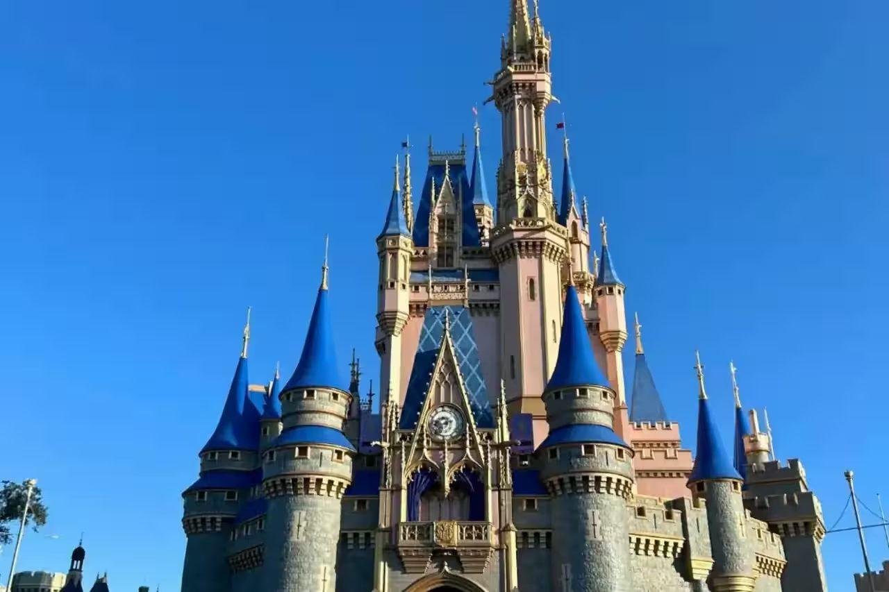 Disney World park entrance with colorful signage